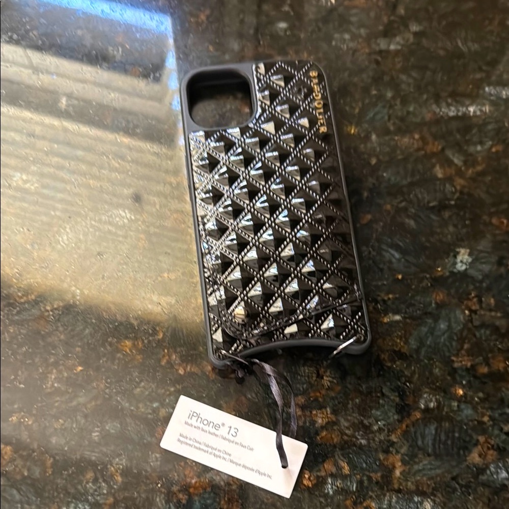 Bandolier Black Pyramid Studded iPhone Case only
I phone 13
NWT